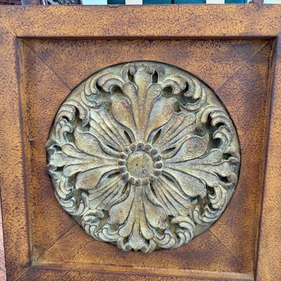Sale Photo Thumbnail #48: Decorative square metal wall plaque featuring a circular, ornate acanthus leaf medallion with a distressed, antiqued gold and green patina finish.