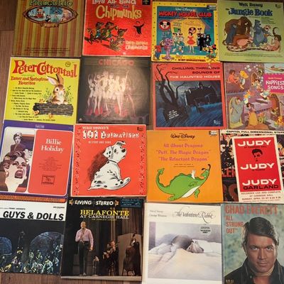 Sale Photo Thumbnail #98: Collection of vintage vinyl records, featuring children's Disney soundtracks, Broadway cast recordings, and classic artists like Billie Holiday, Judy Garland, and Harry Belafonte.