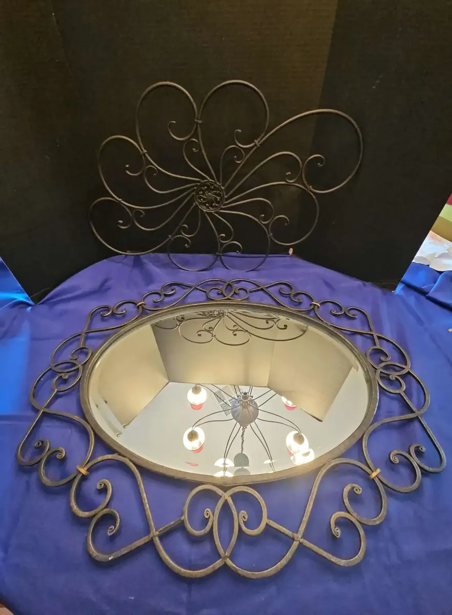 Ornate Oval Wall Mirror With Wrought Iron Style Scrollwork Frame And Metal Wall Decor