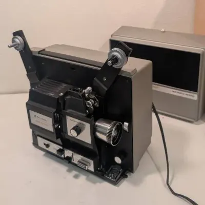 Vintage Bell & Howell Autoload Movie Projector, Operating on 120 Volts and 5 Amps 60 Cycle AC Power