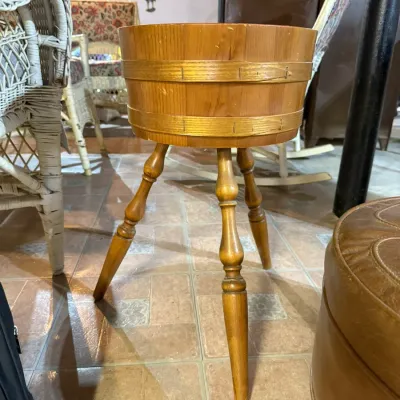Vintage mid-century wooden bucket stand with three turned legs, featuring a barrel-style top with metal bands.