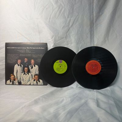 Sale Photo Thumbnail #56: A collection of vintage vinyl records featuring country music artist Sonny James, 'The Southern Gentleman'. Includes the album 'When The Snow Is On The Roses' with its original sleeve, alongside two 12-inch LP records (one with a red Columbia label and on