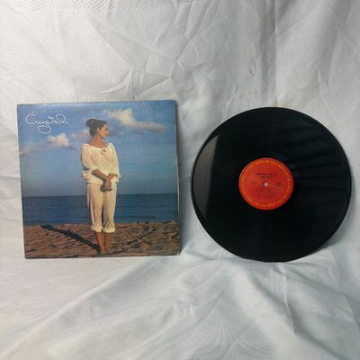 Sale Photo Thumbnail #49: Crystal Gayle "These Days" vinyl record LP, released in 1980 on Columbia Records. Includes the original album jacket and the 12-inch vinyl record. The jacket shows some light edge wear and minor creasing consistent with age, while the vinyl appears to be 