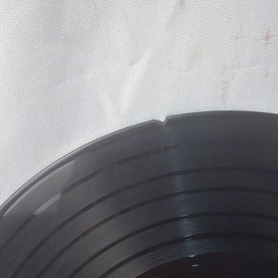 Sale Photo Thumbnail #42: Vintage vinyl record album 'Hymns by Johnny Cash' released on Columbia Records (CL 1284). Includes the original cardboard sleeve. The sleeve shows significant wear, including edge scuffing, discoloration, and tape residue. The vinyl record has a noticeabl