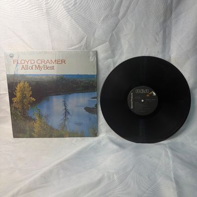 Sale Photo Thumbnail #61: Floyd Cramer - All of My Best vinyl record album. Released on RCA Special Products. Includes the original outer sleeve which remains partially in its original shrink wrap. The vinyl disc shows light surface wear from handling but appears to be in playable