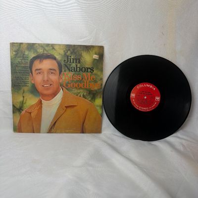 Sale Photo Thumbnail #11: Jim Nabors "Kiss Me Goodbye" vinyl record album. Released on Columbia Records (CS 9620). Includes the original cardboard sleeve and 12-inch vinyl LP. The sleeve shows some light edge wear and age-related discoloration on the back, but remains in good over