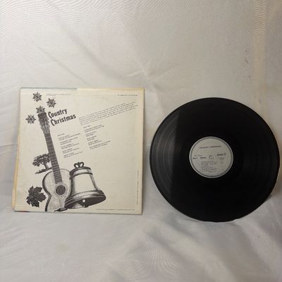 Sale Photo Thumbnail #6: Vintage "Country Christmas" compilation vinyl record album on the Pickwick label (SPC-1012). Features holiday tracks by Tennessee Ernie Ford, Glen Campbell, Sonny James, Ferlin Husky, Buck Owens & His Buckaroos, and Roy Rogers & Dale Evans. Includes the o