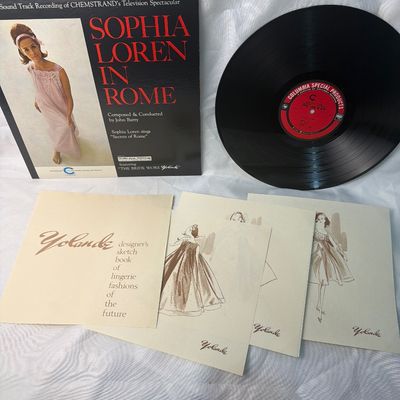 Sale Photo Thumbnail #69: Vintage 1960s Columbia Special Products vinyl record featuring 'Sophia Loren In Rome' (composed and conducted by John Barry) and 'The Bride Wore Yolande' on the reverse side. This unique promotional release includes the original 'Yolande designer's sketch