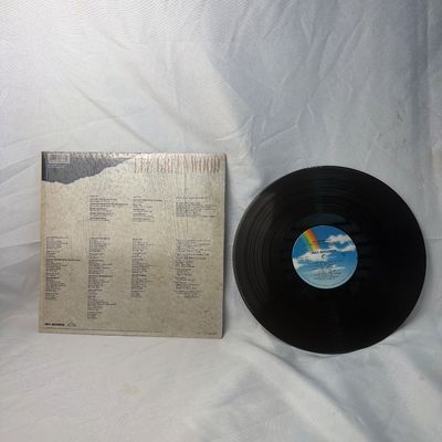 Sale Photo Thumbnail #18: Lee Greenwood "Love Will Find Its Way To You" vinyl record album, released on MCA Records (MCA-5766) in 1986. Includes the original outer sleeve which remains partially in its original shrink wrap. The vinyl disc features the classic rainbow MCA label. Sh