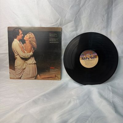 Sale Photo Thumbnail #48: Captain & Tennille 'Make Your Move' vinyl record album, released in 1979 on Casablanca Records. Includes the original album jacket and 12-inch vinyl LP. The jacket shows some light shelf wear and corner scuffs, and has a small yellow price sticker on the 