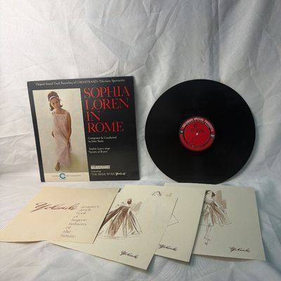 Sale Photo Thumbnail #68: Vintage 1960s Columbia Special Products vinyl record featuring 'Sophia Loren In Rome' (composed and conducted by John Barry) and 'The Bride Wore Yolande' on the reverse side. This unique promotional release includes the original 'Yolande designer's sketch