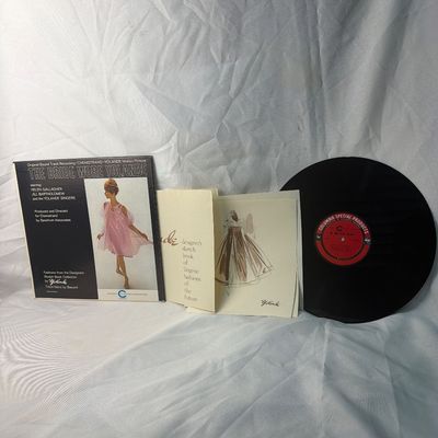 Sale Photo Thumbnail #67: Vintage 1960s Columbia Special Products vinyl record featuring 'Sophia Loren In Rome' (composed and conducted by John Barry) and 'The Bride Wore Yolande' on the reverse side. This unique promotional release includes the original 'Yolande designer's sketch