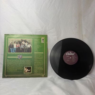 Sale Photo Thumbnail #16: Dr. Hook "Sometimes You Win" vinyl LP record album, released on Capitol Records in 1979. Includes the original illustrated album jacket and the 12-inch vinyl record. The jacket shows some light edge wear, a small handwritten name on the front cover, and a