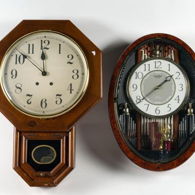 2 Wall Clocks Incl. Small World