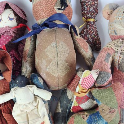12 Stuffed Patchwork Dolls & Composition Doll