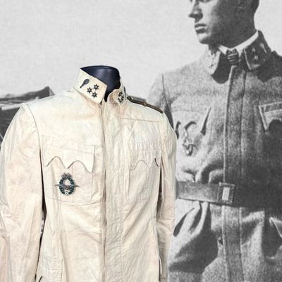 Sale Photo Thumbnail #261: RARE K.u.K. Fliegertruppe Sahariana & Karl Badge