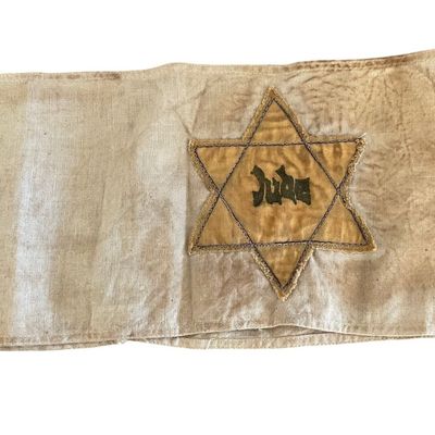 Sale Photo Thumbnail #134: WWII German 'Jude' Yellow Star Armband