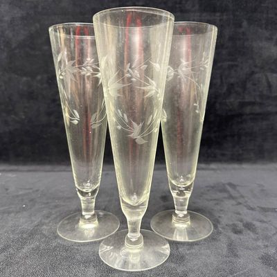 Set of Three Etched Glass Champagne Flutes with Floral Vine Motif Unmarked