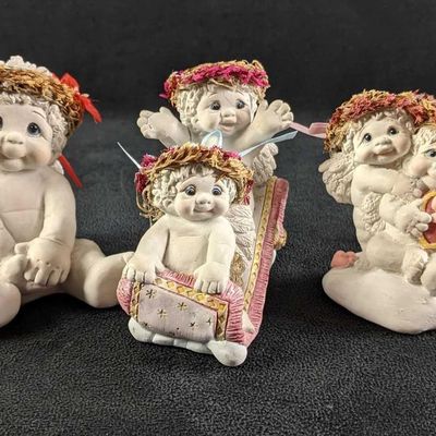 Three Dreamciles Baby Figurines (1) "Christmas Cutie" (2) "Share the Magic" (3) " All My Lovin"