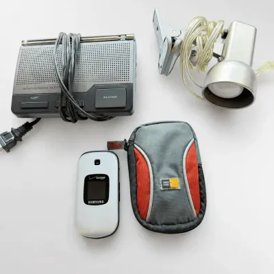 RadioShack Weather Radio Alert, Verizon Samsung Flip Phone, Logic Case, and Clip-On Desk Lamp