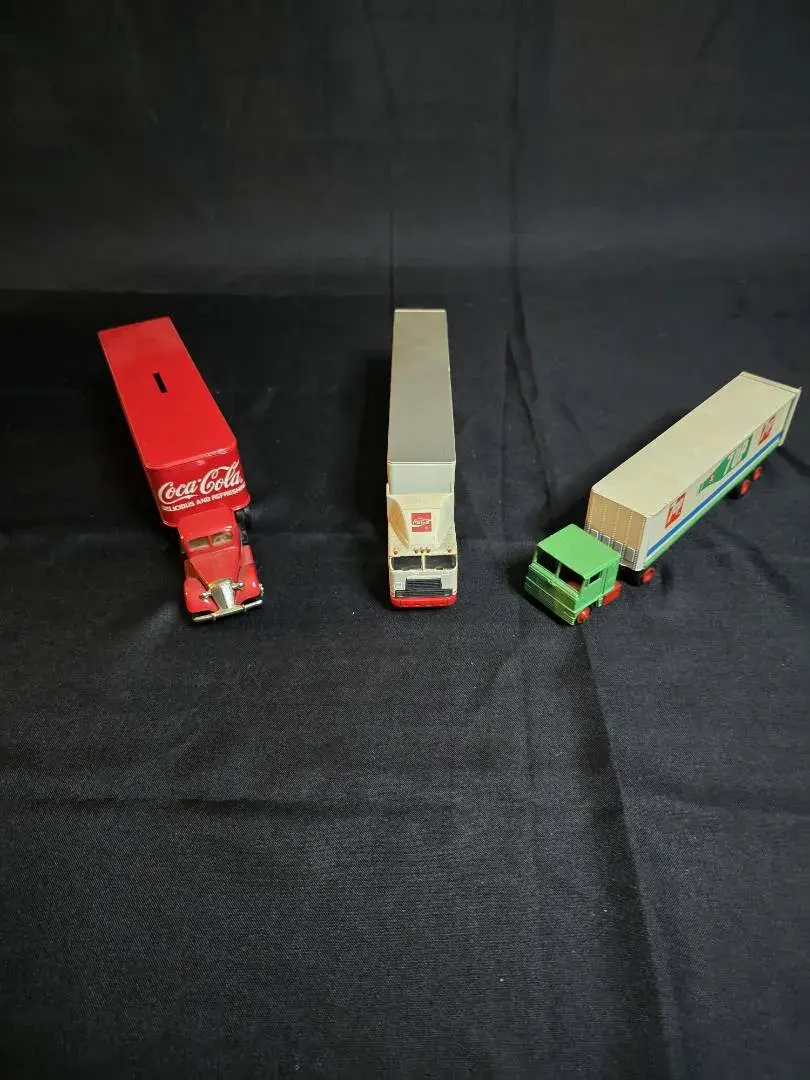 Vintage Soda Brand Toy Semi Trucks Lot of 3 - Coca-Cola Coin Bank & 7UP Semi Trailer Trucks