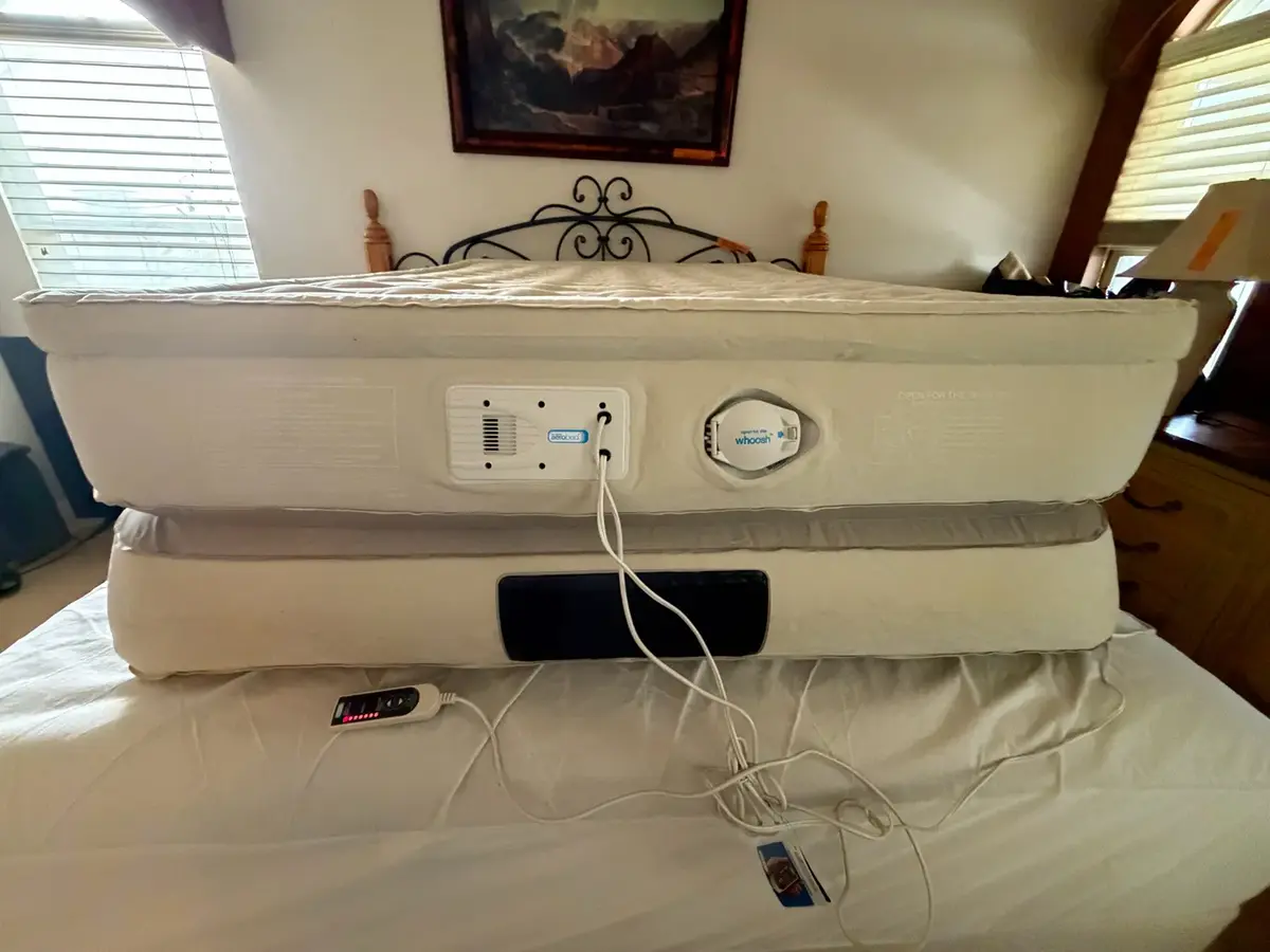 AeroBed inflatable raised air mattress featuring a built-in electric pump and adjustable firmness co