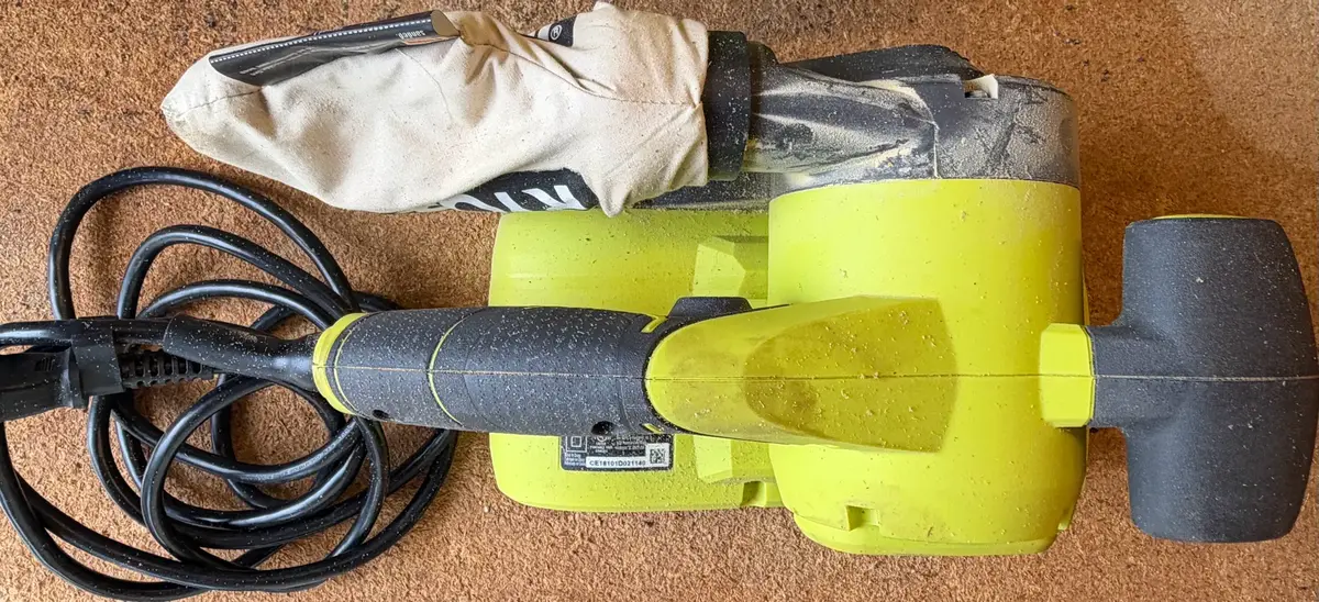 RYOBI 6.0 Amp Corded 3 in. x 18 in. Portable Belt Sander (Model BE319).