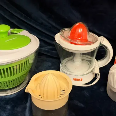 Assortment of Manual and Electric Kitchen Gadgets featuring a Cuisinart Salad Spinner, IMUSA Electri