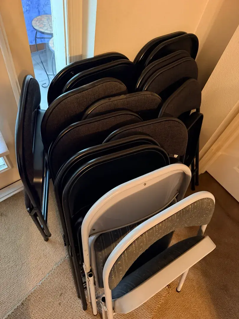 22 Folding Chairs – Black & White Frames