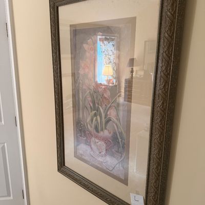 Large framed floral art print depicting potted orchids, housed in an ornate, textured metallic-finish frame with double matting.