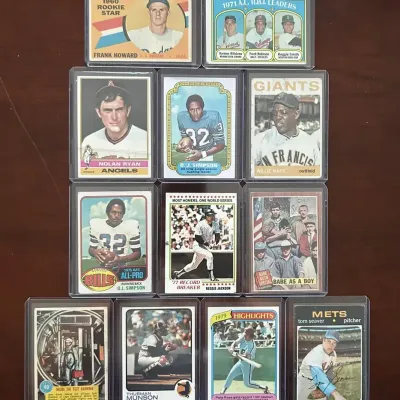 Vintage Sports Cards (Creased). Willie Mays, Nolan Ryan, OJ Simpson, and More