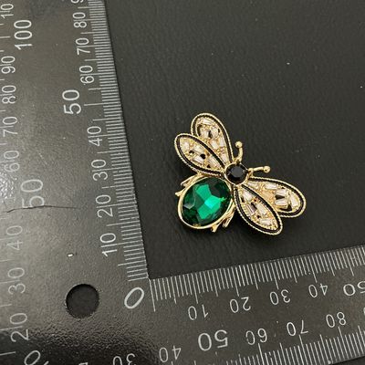 Gold-Tone Bumblebee Brooch with Green and Clear Rhinestones
