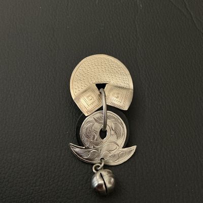 Vintage Silver-Tone Textured Brooch with Dangle Elements