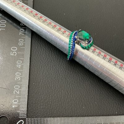 Green and Blue Enamel Bypass Ring with Green Faceted Center Stone