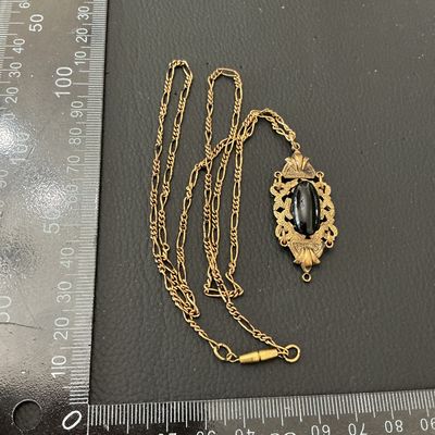 Vintage Gold-Tone Filigree Pendant Necklace with Black Cabochon