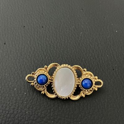Vintage Gold-Tone Brooch with Faux Mother of Pearl and Blue Cabochons