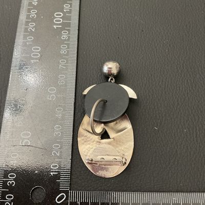 Vintage Silver-Tone Textured Brooch with Dangle Elements