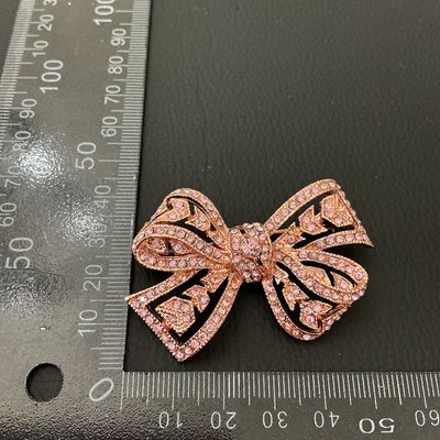 KJL Kenneth Jay Lane Rose Gold Tone Pink Rhinestone Bow Brooch