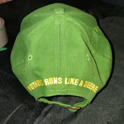 JOHN DEERE OWNER'S EDITION HAT AND DIE CAST TRACTOR