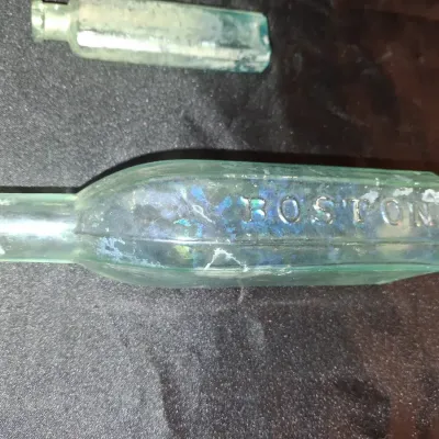 ANTIQUE BOTTLES WITH RAISED LETTERING