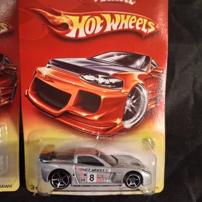 '06 HOT WHEELS ON DAMAGED RED CARDS
