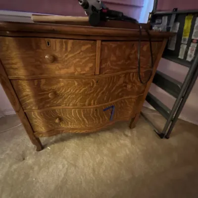 Antique tiger oak serpentine dresser 
