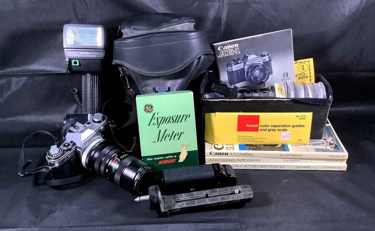 Vintage Canon AE-1 35mm SLR Camera Lot w/ Lenses, Vivitar Filters & Exposure Meter