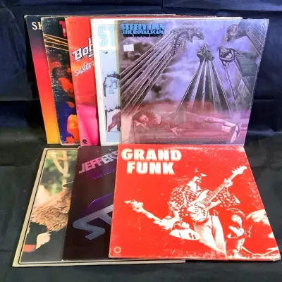 (8) Vinyl Records - Jefferson Starship, Lynard Skynard, Grand Funk & More!