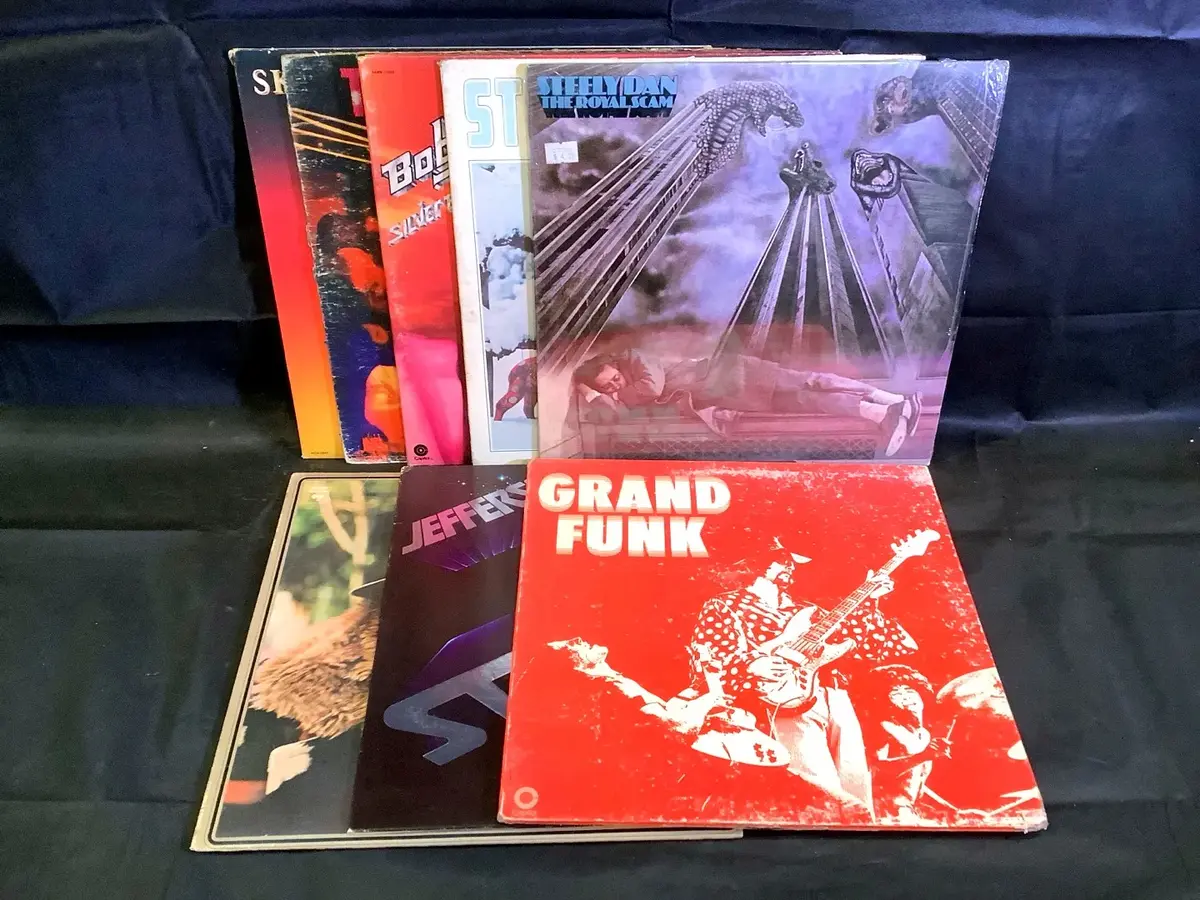 (8) Vinyl Records - Jefferson Starship, Lynard Skynard, Grand Funk & More!