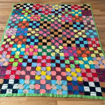 Colorful Quilt W/ Green Backing 