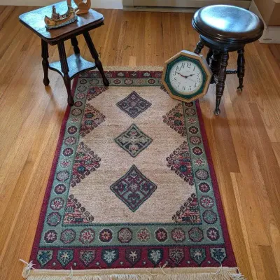 Wool Area Rug, Ingraham Clock, Side Table, Coyote Folk Art & Russ Berrie Figuri
