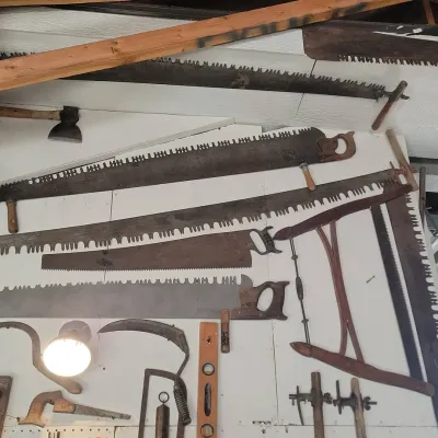 Antique Logging and Hand Saws And Hatchets