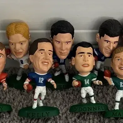 1996 Corinthian Headliners NFL mini caricature figurines.