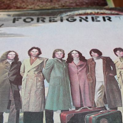 Foreigner self-titled debut vinyl LP album, released in 1977, featuring handwritten initials on the upper cover.